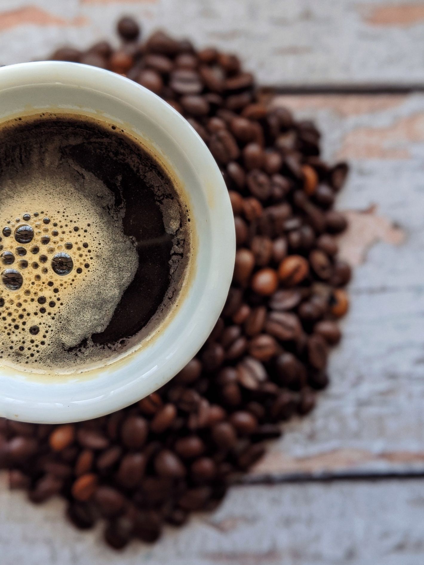 koffiebonen ondergrond kopje espresso koffie